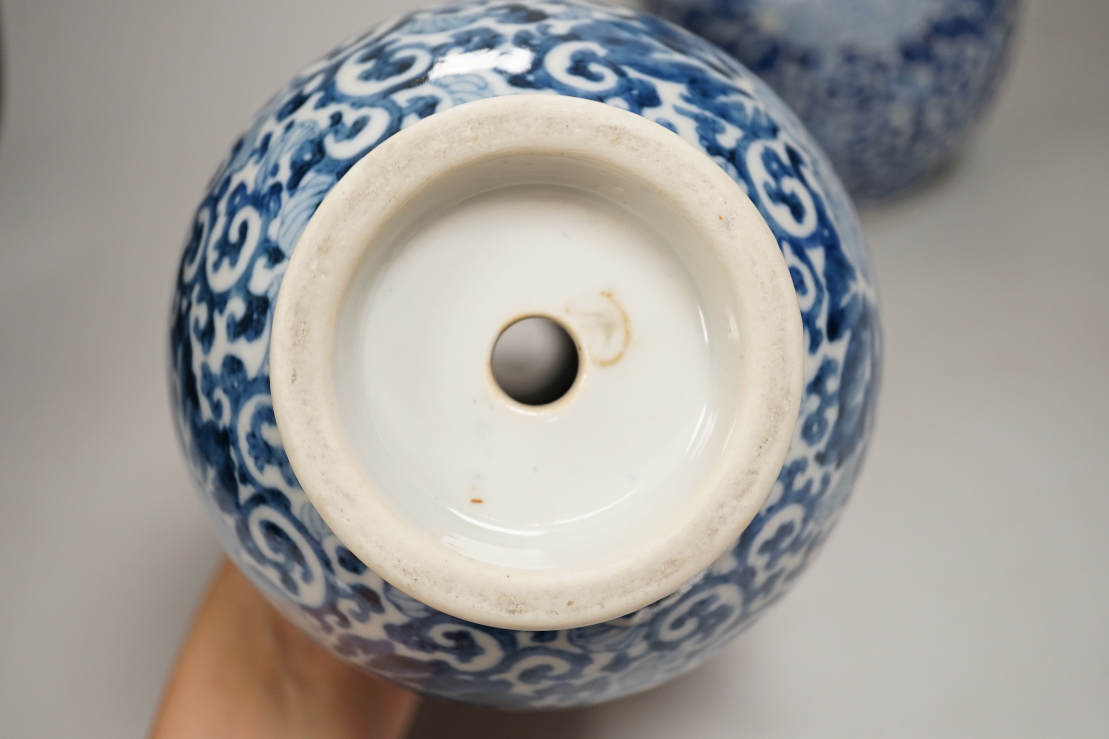 A pair of Chinese blue and white vases, 26cm high